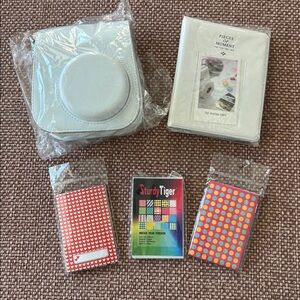 An accessory bundle for a Fujifilm Instax Mini 11